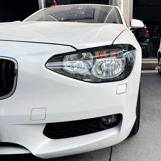 2 x Gloss Black Headlight Eyelid Trim Covers for BMW 1 Series F20 F21 (11-14)