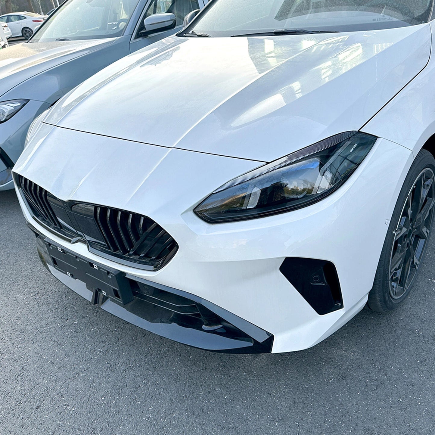 2 x Carbon Look Headlight Eyelid Trim Covers for BMW F70 F74 (2024-2025)