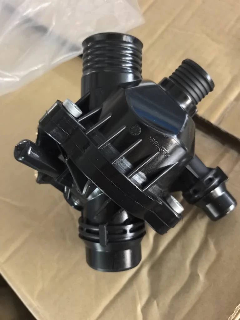 Thermostat Housing Assembly for BMW E60 E82 E84 E90 128i 328i 335i (2003–2015)