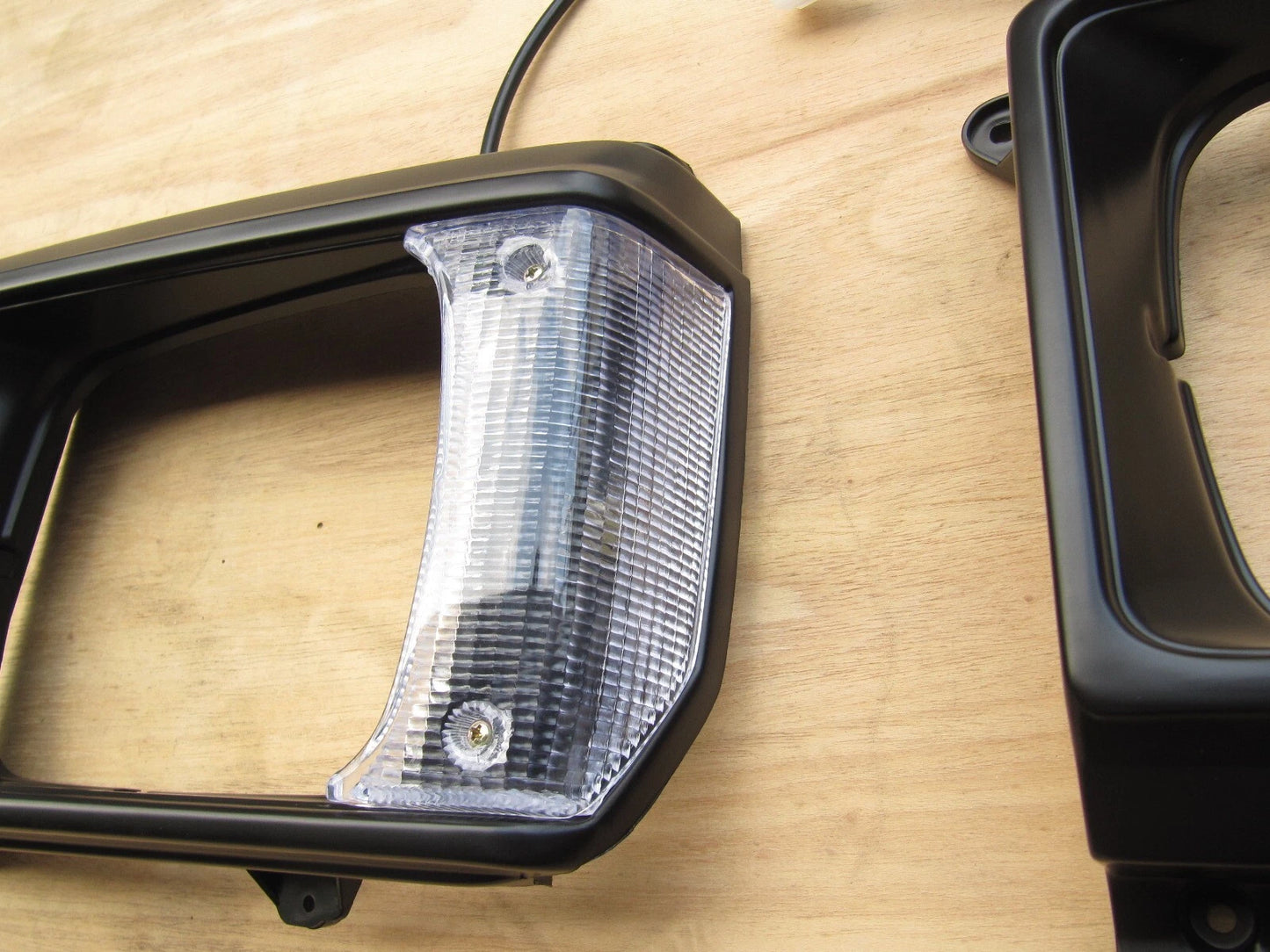 Head Light Door Bezel for Toyota Hilux (1982-1983)